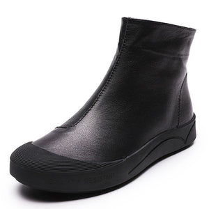 Black leather flat ankle boots