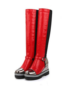 Red platform knee-high boots